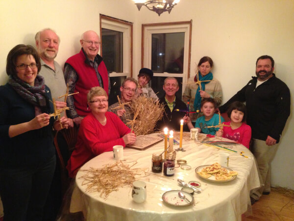 A group gathered for the eve of St. Bridget's Feast Day